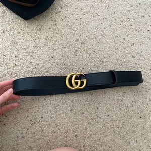 Black belt with gold buckle